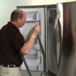 how to rehang a refrigerator door Indesit