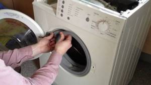 Как почистить резинку в стиральной машине