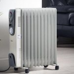 масляный обогреватель в доме