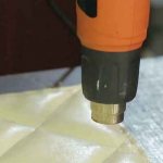 Unusual use of a hair dryer